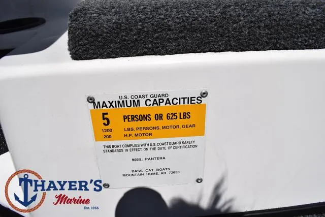 Slide: The Image of Bass Cat Pantera IV 2012 boat capacity label, 5 persons or 625 lbs, Thayer's Marine logo. - 38