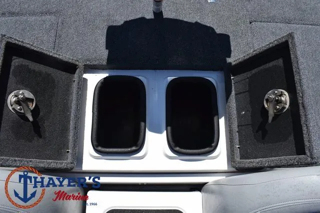 Slide: The Image of 2012 Bass Cat Pantera IV boat storage compartments, Thayer's Marine logo visible. - 42