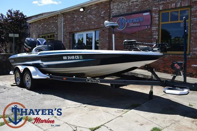 Slide: The Image of 2012 Bass Cat Pantera IV boat on trailer at Thayer's Marine dealership. - 48