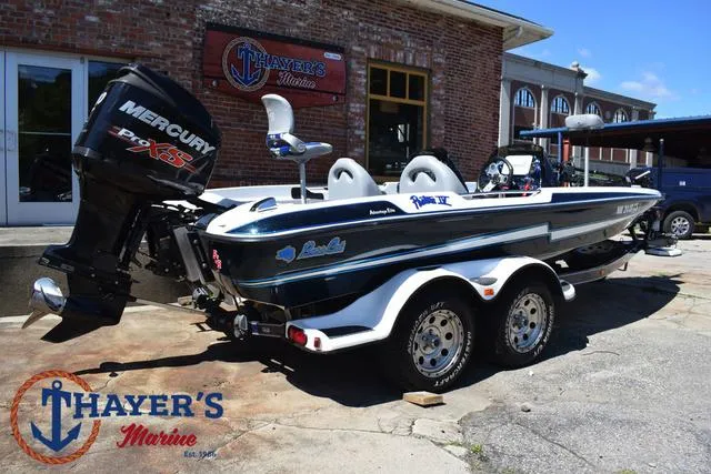 Slide: The Image of 2012 Bass Cat Pantera IV boat with Mercury Pro XS engine at Thayer's Marine. - 49