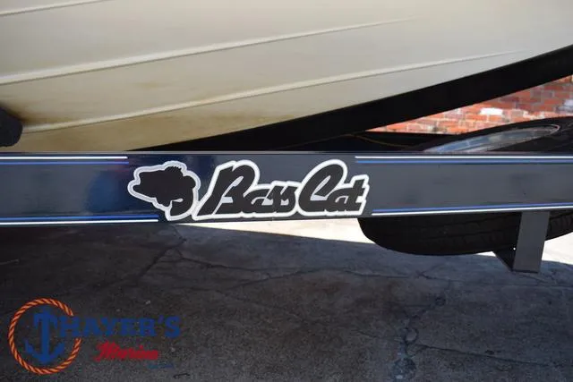 Slide: The Image of Bass Cat Pantera IV 2012 boat trailer with logo, Thayer's Marine branding visible. - 5