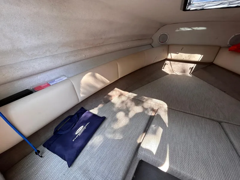 Slide: The Image of Interior cabin of 2005 Chaparral 215 SSi boat with seating and storage. - 24