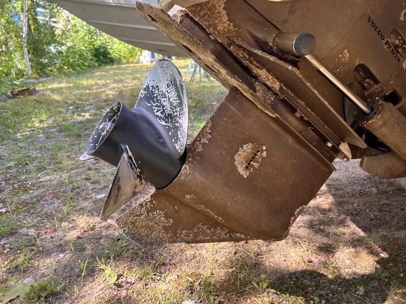 Slide: The Image of Close-up of a 2005 Chaparral 215 SSi boat propeller with visible wear and rust. - 28