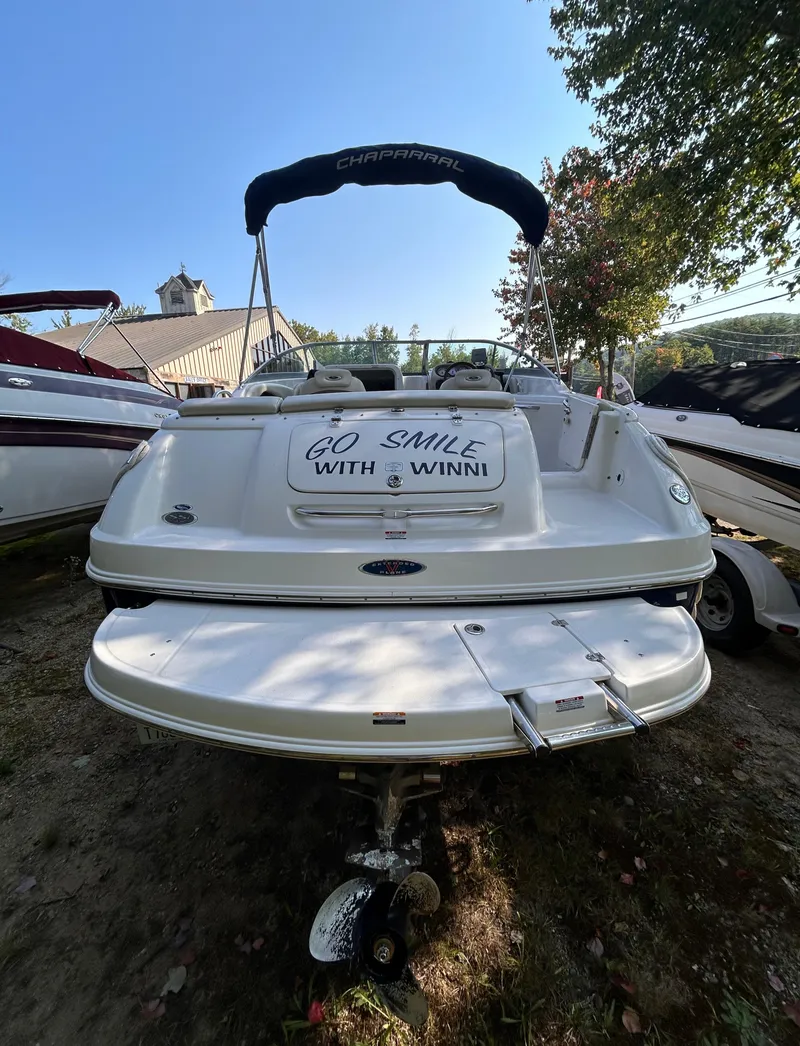 Slide: The Image of 2005 Chaparral 215 SSi boat with "Go Smile with Winni" text on the back. - 5