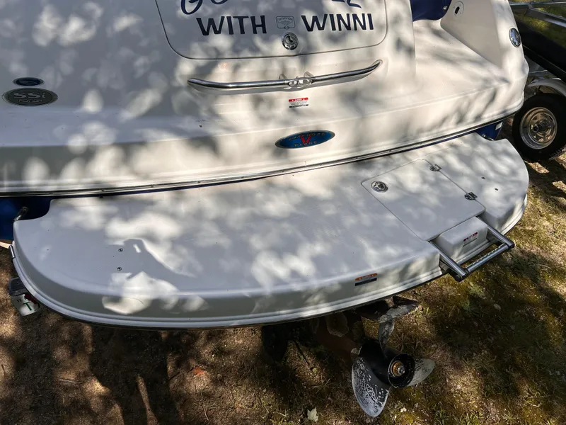 Slide: The Image of 2005 Chaparral 215 SSi boat stern with swim platform and ladder. - 6