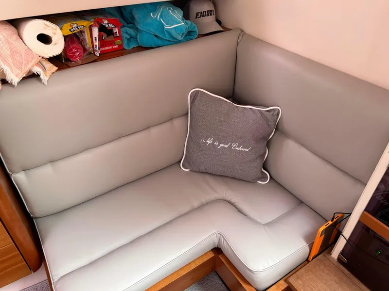 Slide: The Image of Cozy seating area in 2012 Fjord 40 Open yacht with decorative pillow. - 10