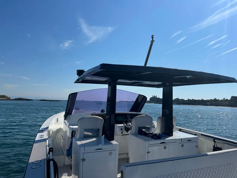 Slide: The Image of 2012 Fjord 40 Open yacht on calm waters under a clear blue sky. - 6