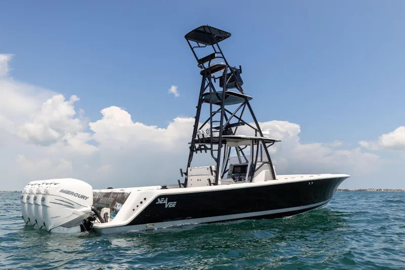 Slide: The Image of 2008 SeaVee 390 B boat with tower on open water. - 10