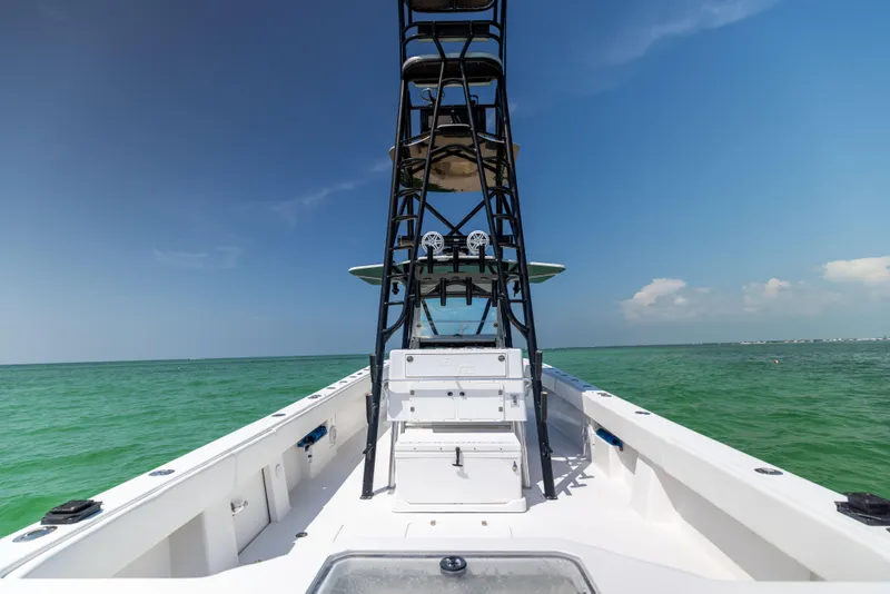 Slide: The Image of 2008 SeaVee 390 B boat on open water under clear blue sky. - 20