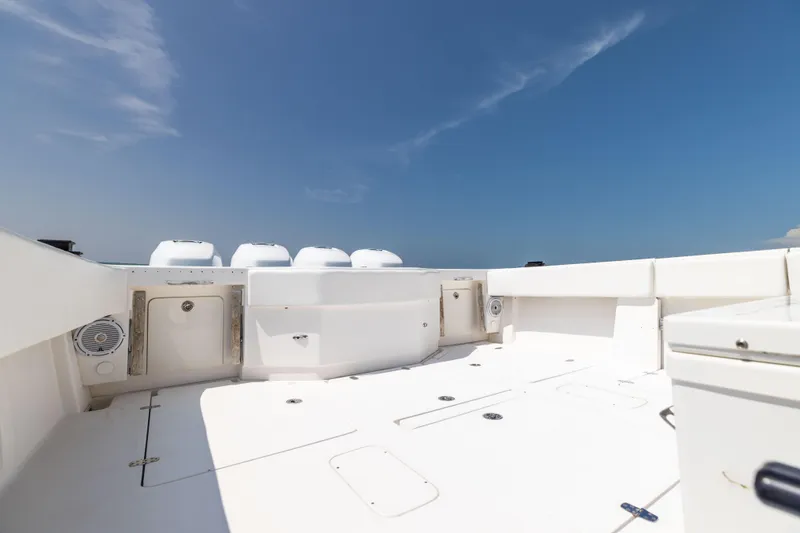 Slide: The Image of 2008 SeaVee 390 B boat deck under clear blue sky. - 24