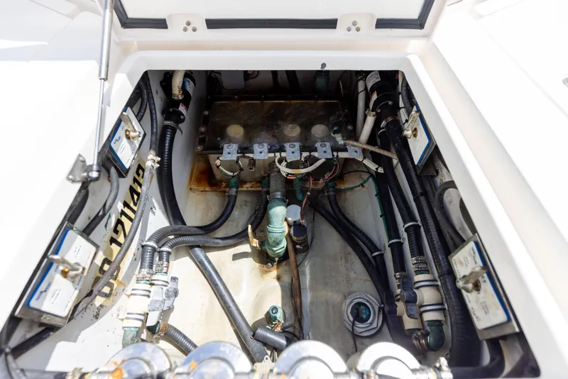 Slide: The Image of Engine compartment of 2008 SeaVee 390 B boat, showcasing detailed wiring and components. - 25