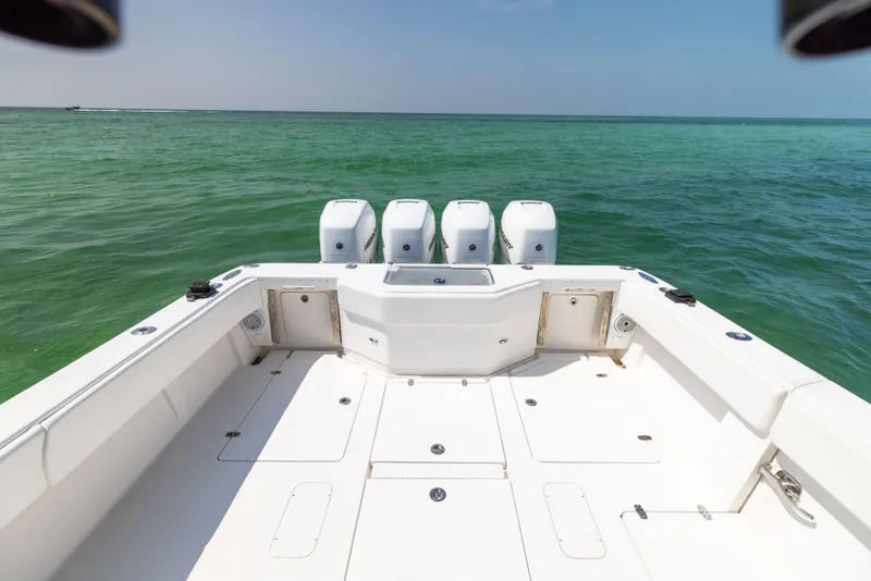 Slide: The Image of 2008 SeaVee 390 B boat with four engines on open sea. - 29