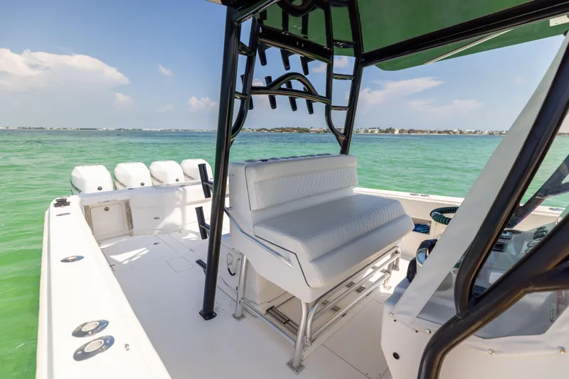 Slide: The Image of 2008 SeaVee 390 B boat with seating, ocean view, and clear skies. - 34
