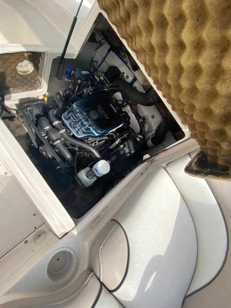 Slide: The Image of Engine compartment of a 2004 Sea Ray 240 Sundeck boat. - 5