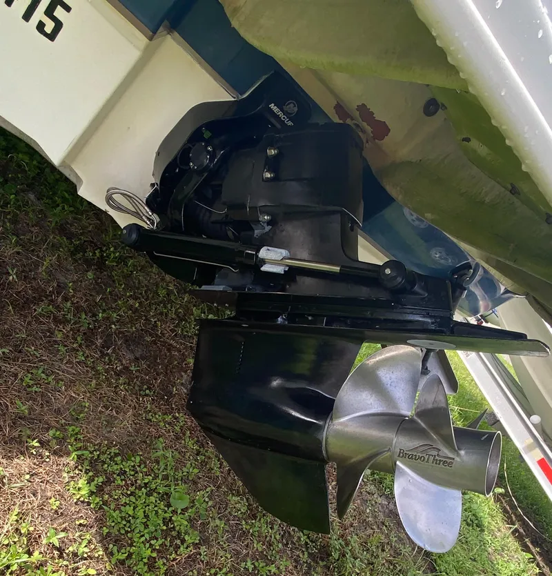 Slide: The Image of Close-up of 2004 Sea Ray 240 Sundeck boat propeller and stern drive. - 7