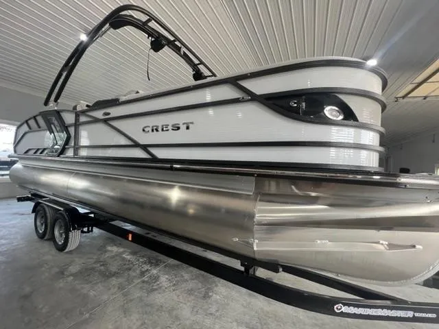 Slide: The Image of 2023 Crest Caribbean RS 250 SLC pontoon boat in a showroom. - 10
