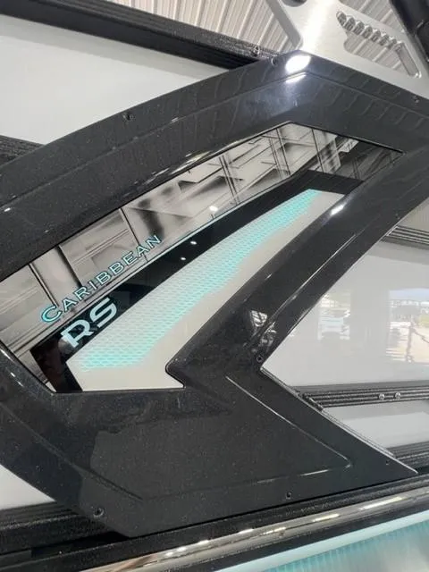 Slide: The Image of 2023 Crest Caribbean RS 250 SLC boat detail with sleek design and modern accents. - 4