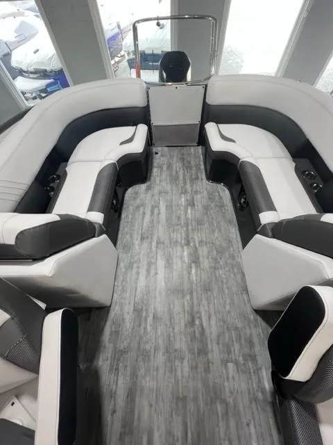 Slide: The Image of 2023 Crest Caribbean RS 250 SLC boat interior with modern seating and sleek design. - 6