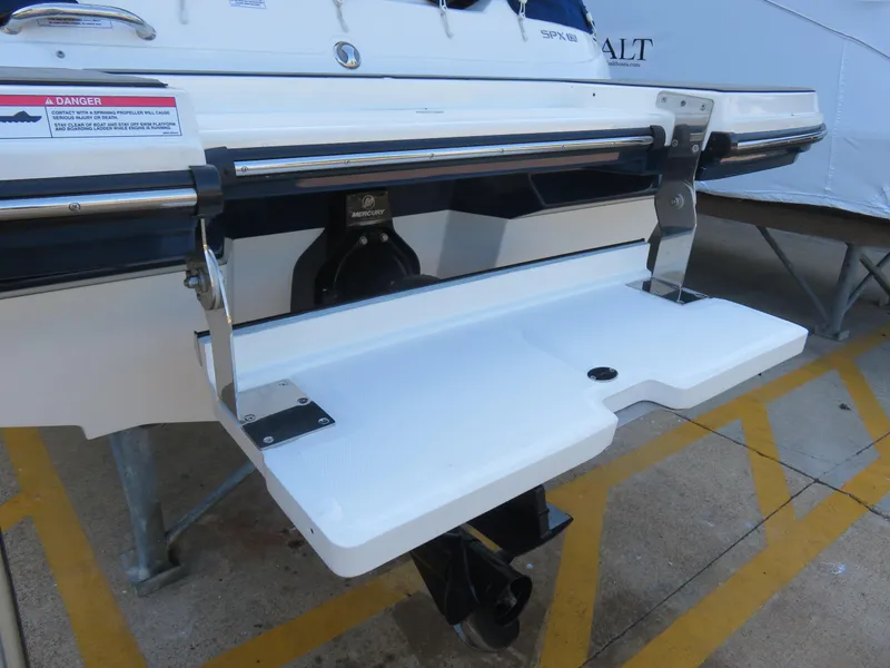 Slide: The Image of 2022 Sea Ray 19 SPX boat with swim platform and Mercury engine. - 8