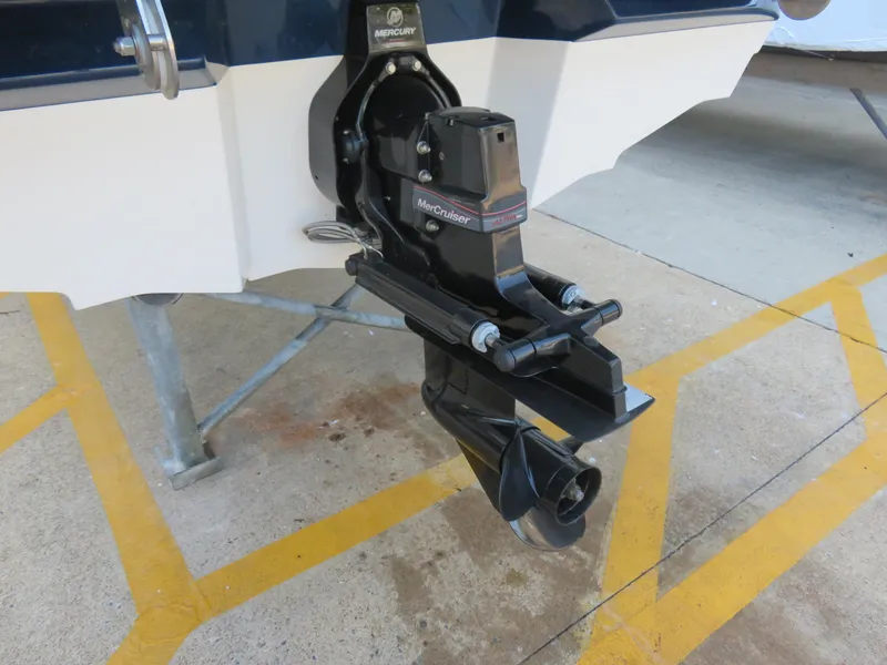 Slide: The Image of 2022 Sea Ray 19 SPX boat with MerCruiser outboard motor on display. - 9