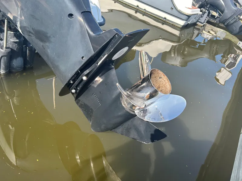 Slide: The Image of Close-up of a 2013 Boston Whaler 230 Dauntless boat propeller in water. - 3