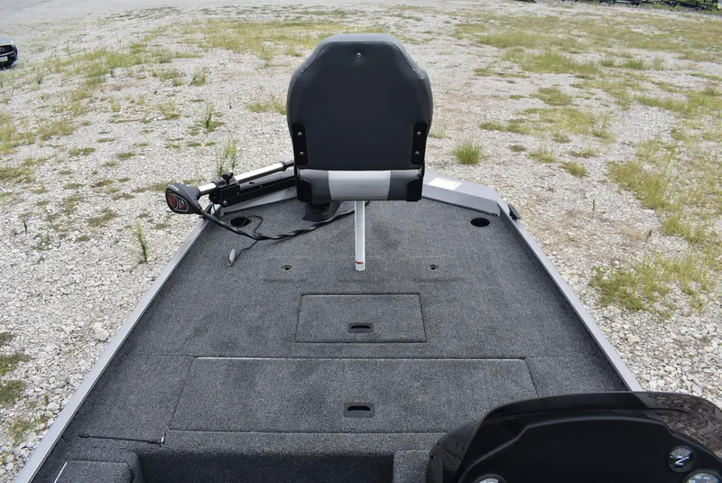 Slide: The Image of 2025 Lowe 16 Skorpion boat interior with fishing seat and storage compartments. - 11