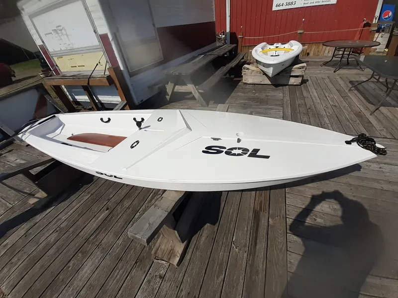 Slide: The Image of 2024 SERO Innovation SOL boat displayed on wooden dock. - 3