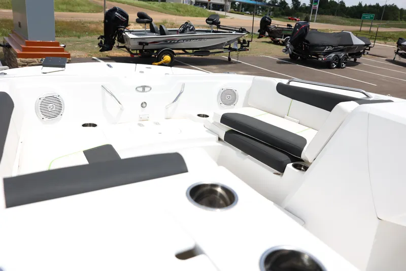 Slide: The Image of Interior of a 2022 Tahoe 1950 boat with seating and cup holders. - 7