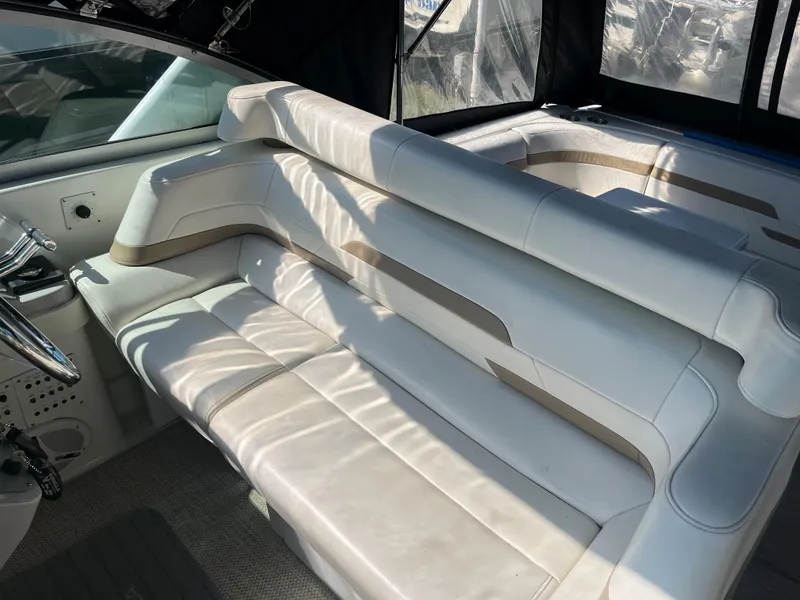 Slide: The Image of 1999 Formula 41 Performance Cruiser interior with white leather seating. - 11