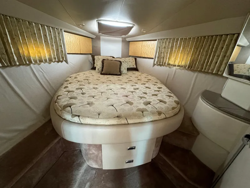 Slide: The Image of 1999 Formula 41 Performance Cruiser cabin with cozy bed and elegant decor. - 27