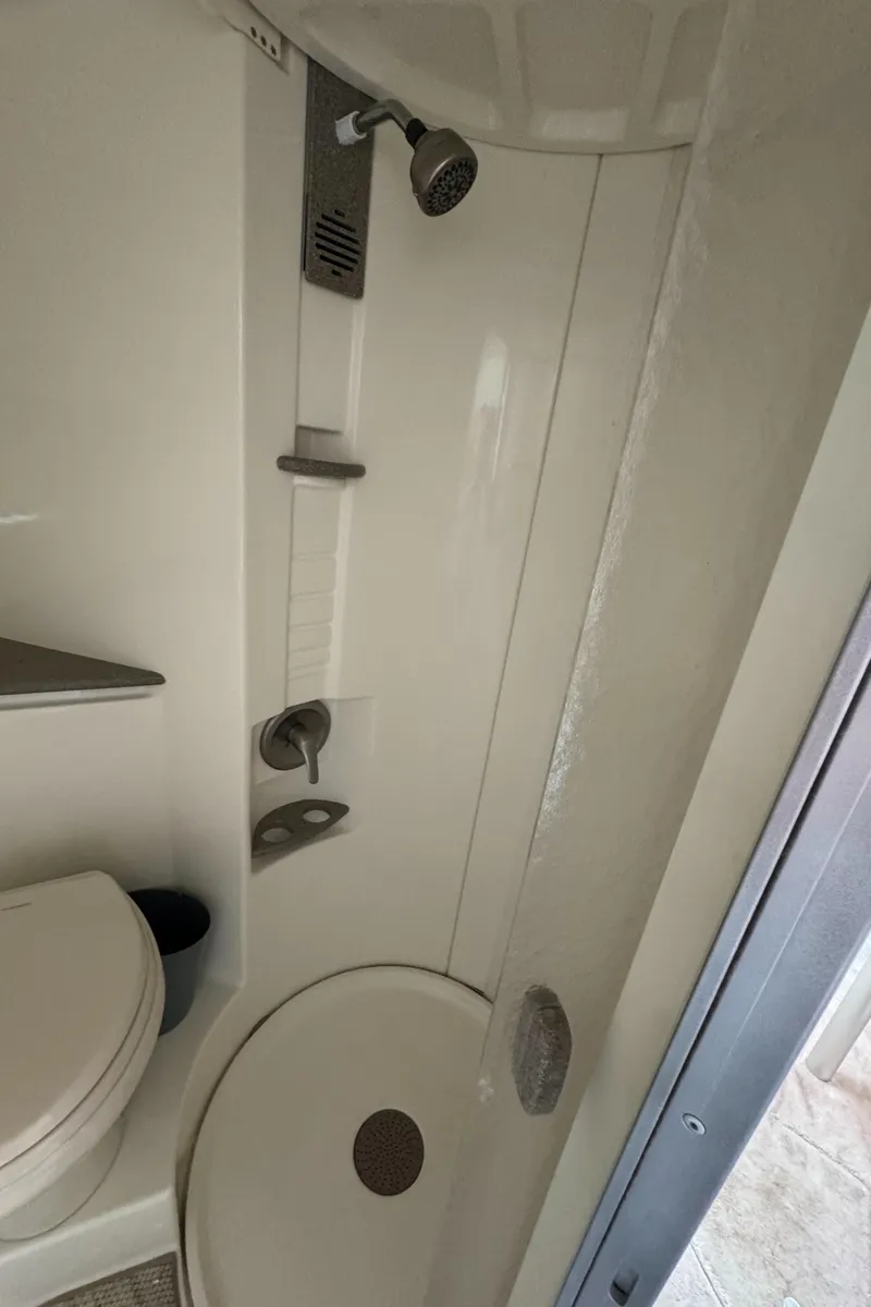 Slide: The Image of Bathroom interior of 1999 Formula 41 Performance Cruiser with shower and toilet. - 35