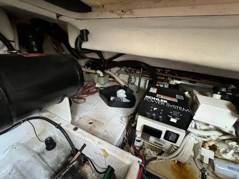 Slide: The Image of Engine room of 1999 Formula 41 Performance Cruiser with Kohler power system and wiring. - 44