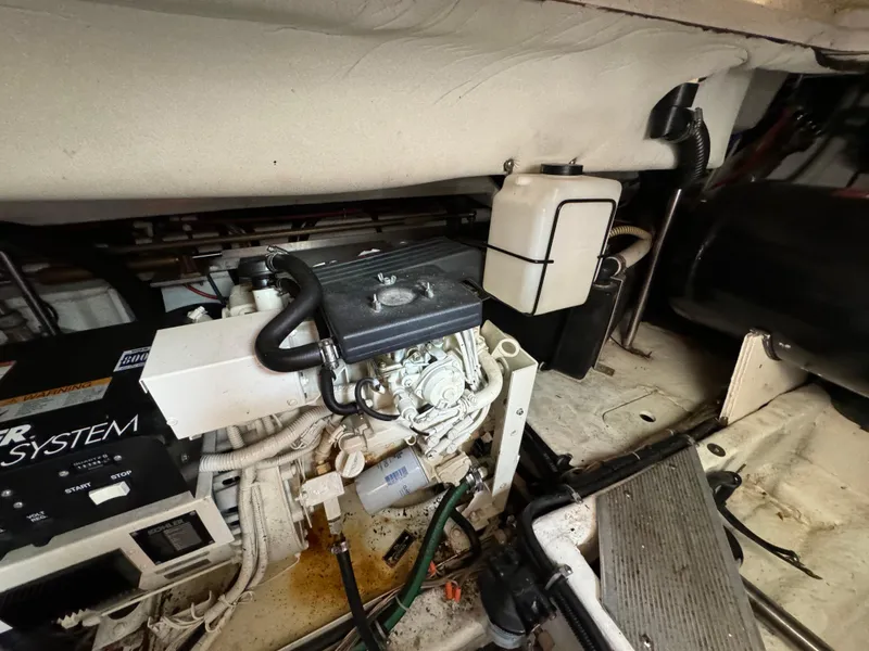 Slide: The Image of Engine compartment of a 1999 Formula 41 Performance Cruiser boat. - 45