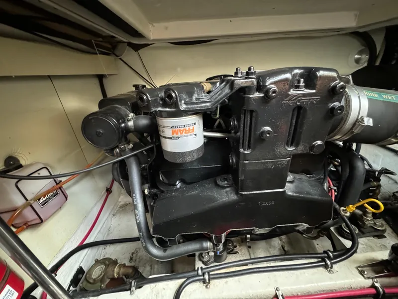 Slide: The Image of Engine compartment of a 1999 Formula 41 Performance Cruiser, showcasing detailed mechanical components. - 49