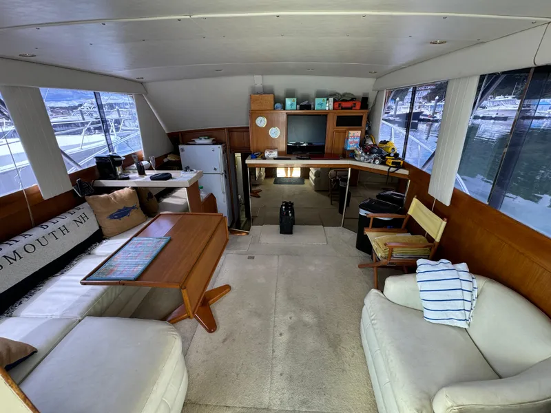 Slide: The Image of Interior of 1990 Post 44 Sport Fisherman yacht with seating and table. - 14