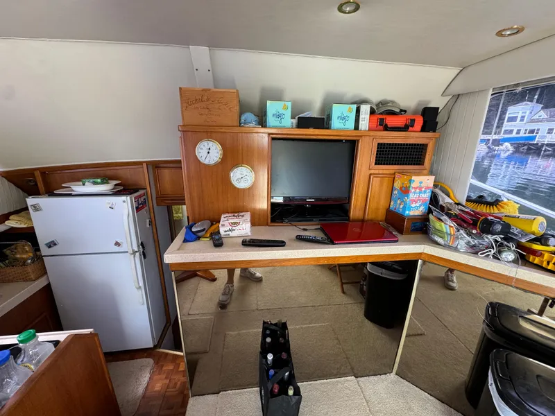 Slide: The Image of Interior of 1990 Post 44 Sport Fisherman with kitchen and entertainment area. - 17