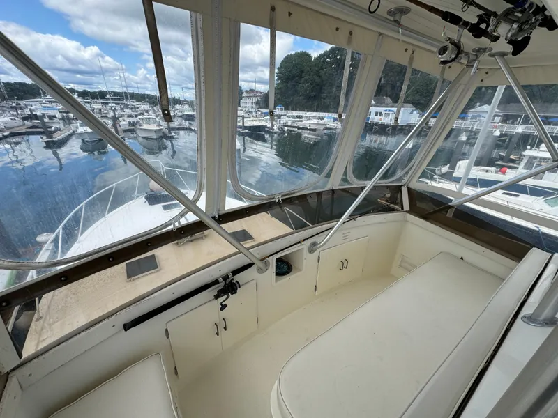 Slide: The Image of 1990 Post 44 Sport Fisherman boat interior with marina view. - 36