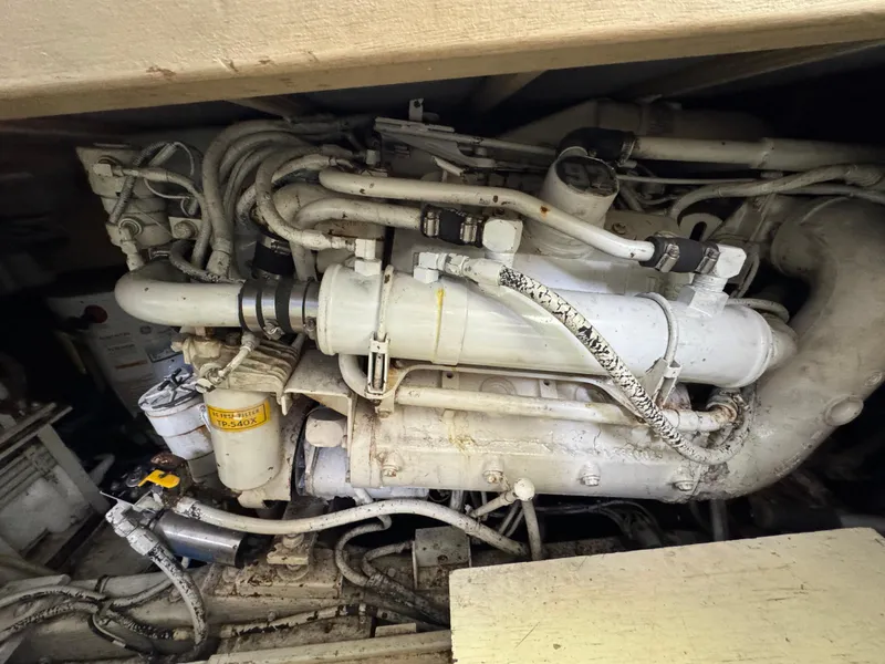 Slide: The Image of Engine compartment of a 1990 Post 44 Sport Fisherman boat. - 40