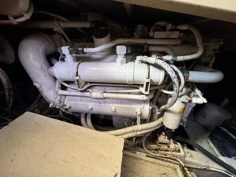 Slide: The Image of Engine compartment of a 1990 Post 44 Sport Fisherman boat. - 41