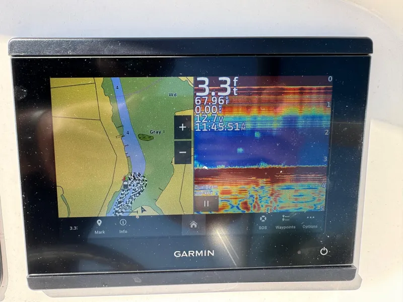 Slide: The Image of Garmin navigation display on 2022 Robalo R207 Dual Console boat. - 21