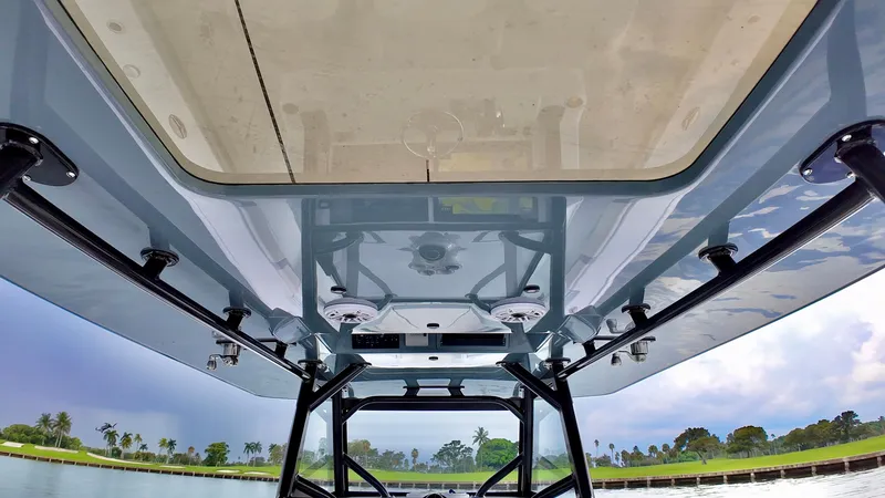 Slide: The Image of View from under the canopy of a 2022 Yellowfin 42 Offshore boat. - 16