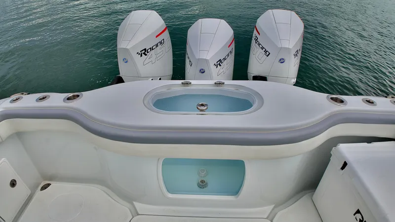 Slide: The Image of 2022 Yellowfin 42 Offshore boat with triple Racing engines. - 9