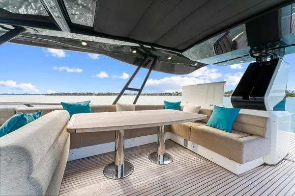 Slide: The Image of Luxurious Monte Carlo Yachts MCY 70 deck with elegant seating and ocean view, 2018 model. - 31