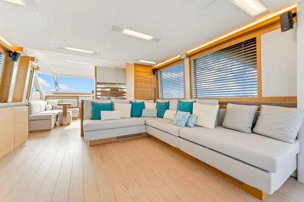 Slide: The Image of Luxurious interior of 2018 Monte Carlo Yachts MCY 70 with modern seating and elegant design. - 38