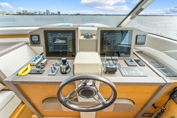 Slide: The Image of Monte Carlo Yachts MCY 70 helm with advanced navigation systems, 2018 model. - 46