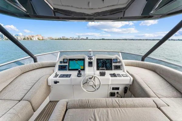 Slide: The Image of Luxurious 2018 Monte Carlo Yachts MCY 70 helm with panoramic ocean view. - 29