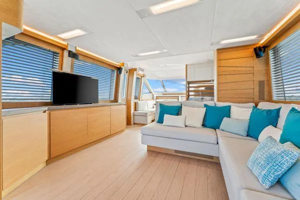 Slide: The Image of Luxurious interior of 2018 Monte Carlo Yachts MCY 70 with modern decor and large windows. - 39