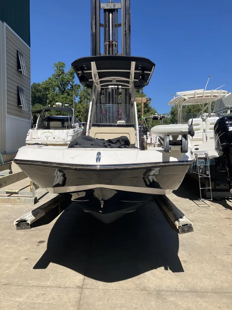 Slide: The Image of 2022 Yamaha Boats 190 FSH Sport on dock, ready for adventure. - 5