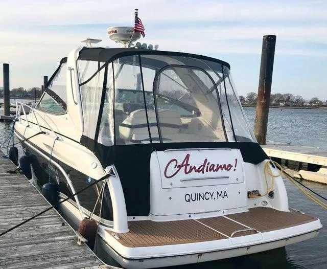 Slide: The Image of 2007 Formula 31 Cruiser docked in Quincy, MA with "Andiamo!" signage. - 1