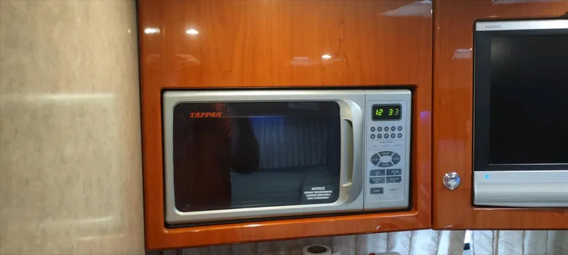 Slide: The Image of Built-in microwave in 2007 Formula 31 Cruiser yacht kitchen. - 12